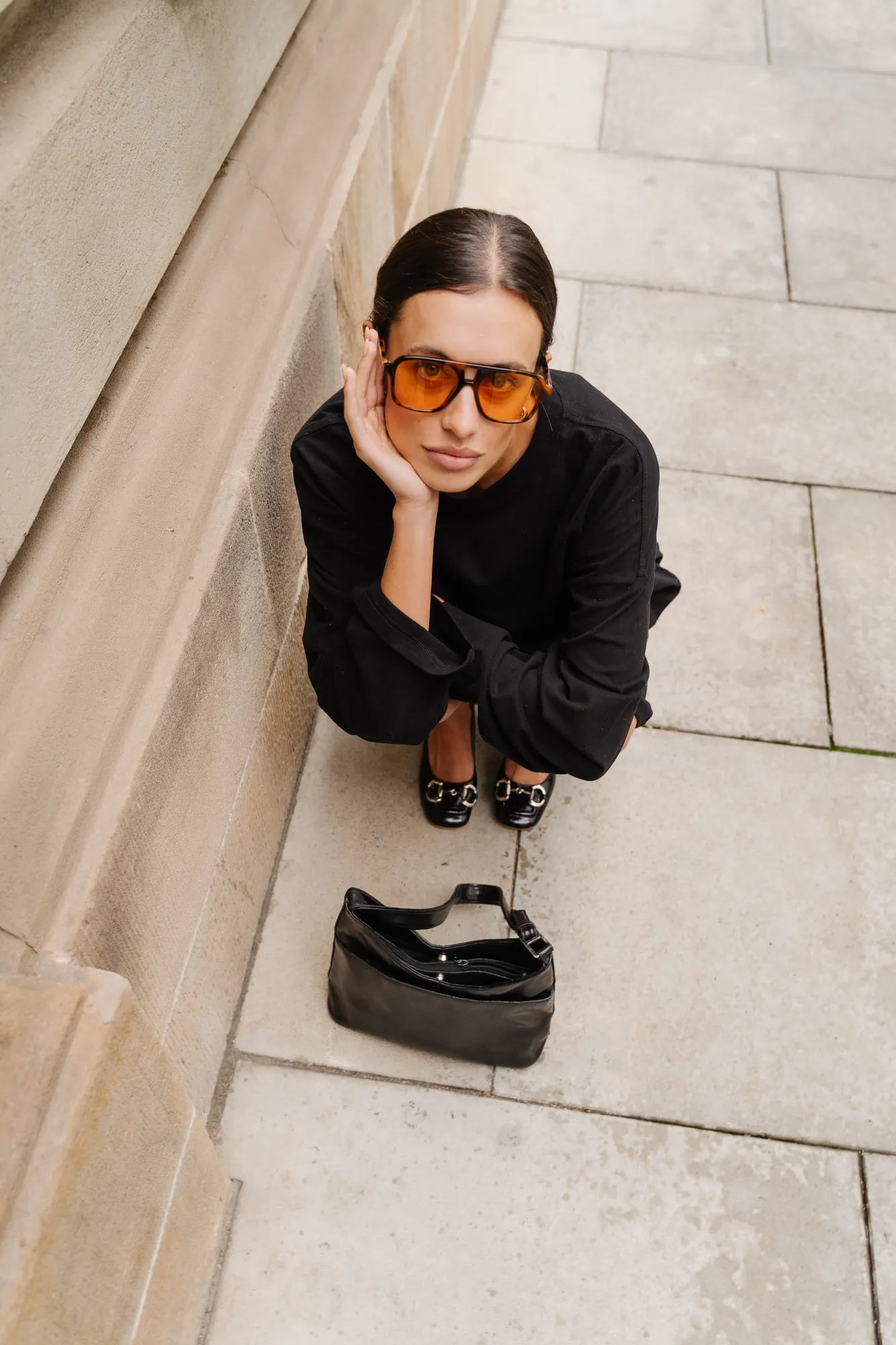 Penn Shoes autumn campaign: black shirt and chunky black loafers, shot from above